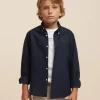 CAMISA OXFORD SOLID KIDS AZUL MARINO